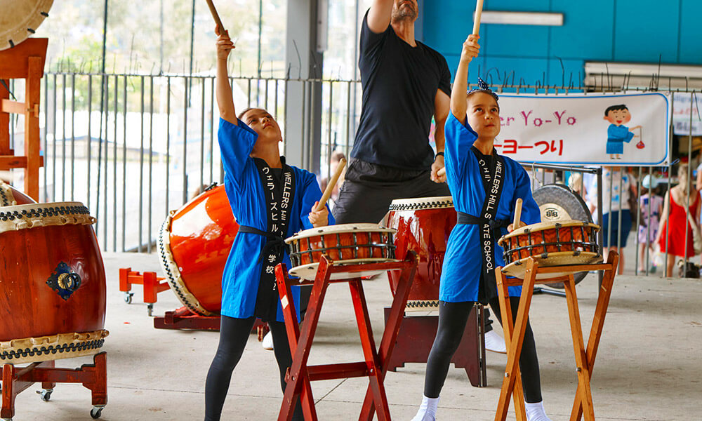 Wellers Hill State School students drumming at Bunkasai 2018 festival